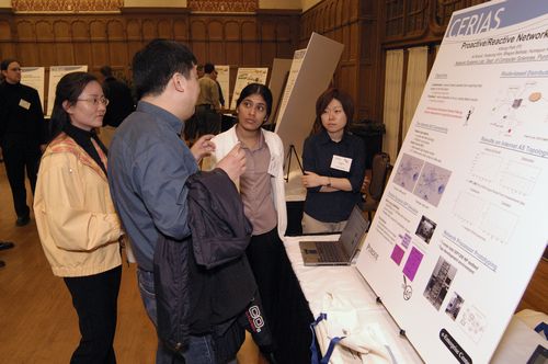 The Symposium kicked off with a poster session in which over 50 students & faculty teams presented their work and discussed their research.
