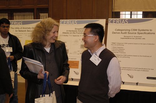 The Symposium kicked off with a poster session in which over 50 students & faculty teams presented their work and discussed their research.