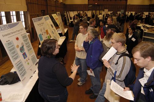 The Symposium kicked off with a poster session in which over 50 students & faculty teams presented their work and discussed their research.