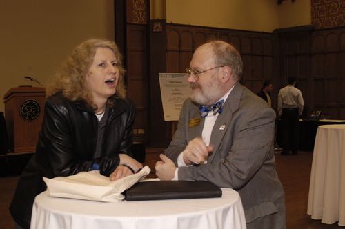 The Symposium kicked off with a poster session in which over 50 students & faculty teams presented their work and discussed their research.