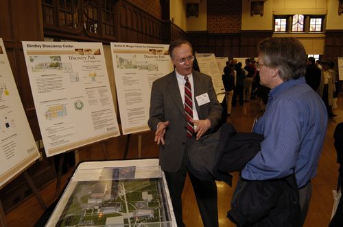 The Symposium kicked off with a poster session in which over 50 students & faculty teams presented their work and discussed their research.
