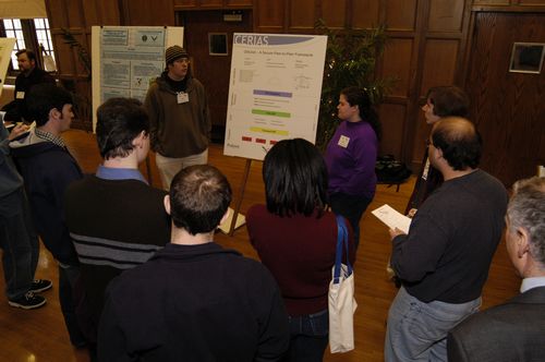 The Symposium kicked off with a poster session in which over 50 students & faculty teams presented their work and discussed their research.
