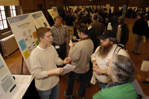 The Symposium kicked off with a poster session in which over 50 students & faculty teams presented their work and discussed their research.