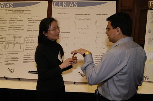 The Symposium kicked off with a poster session in which over 50 students & faculty teams presented their work and discussed their research.