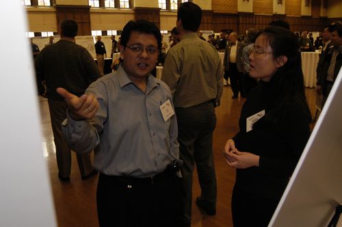 The Symposium kicked off with a poster session in which over 50 students & faculty teams presented their work and discussed their research.