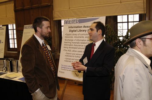 The Symposium kicked off with a poster session in which over 50 students & faculty teams presented their work and discussed their research.