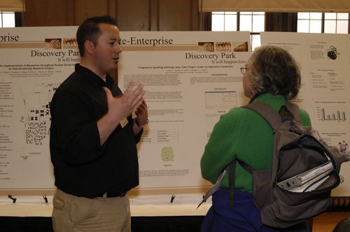 The Symposium kicked off with a poster session in which over 50 students & faculty teams presented their work and discussed their research.