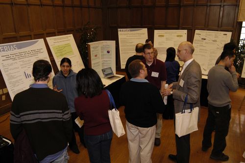 The Symposium kicked off with a poster session in which over 50 students & faculty teams presented their work and discussed their research.