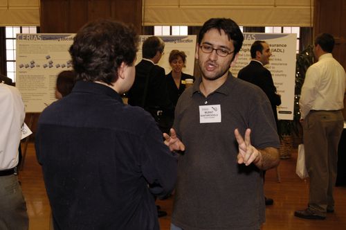 The Symposium kicked off with a poster session in which over 50 students & faculty teams presented their work and discussed their research.