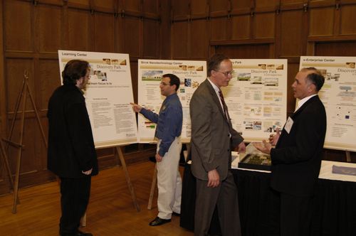 The Symposium kicked off with a poster session in which over 50 students & faculty teams presented their work and discussed their research.