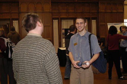The Symposium kicked off with a poster session in which over 50 students & faculty teams presented their work and discussed their research.