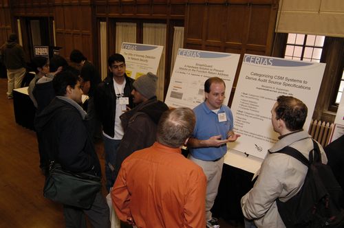 The Symposium kicked off with a poster session in which over 50 students & faculty teams presented their work and discussed their research.