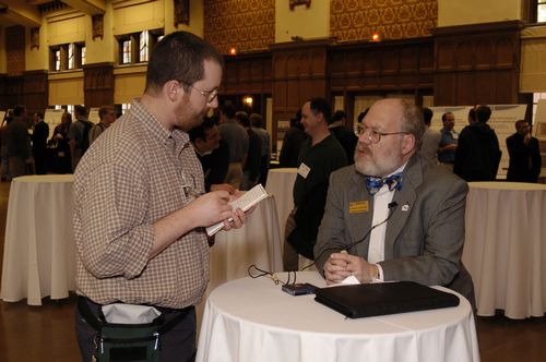 The Symposium kicked off with a poster session in which over 50 students & faculty teams presented their work and discussed their research.