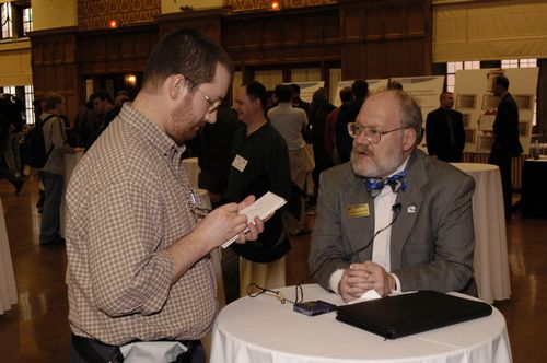 The Symposium kicked off with a poster session in which over 50 students & faculty teams presented their work and discussed their research.
