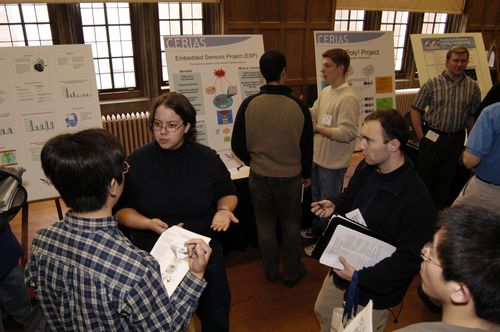 The Symposium kicked off with a poster session in which over 50 students & faculty teams presented their work and discussed their research.