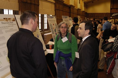 The Symposium kicked off with a poster session in which over 50 students & faculty teams presented their work and discussed their research.
