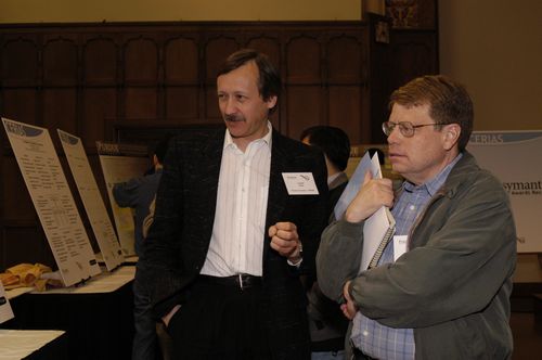 The Symposium kicked off with a poster session in which over 50 students & faculty teams presented their work and discussed their research.