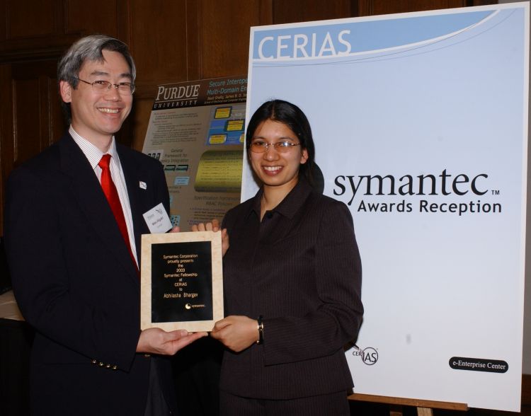 Abhilashe Bhargav recieves the Symantec Fellowship, a two-year graduate fellowship and research award.  Wes Higaki, Director of University Research for Symantec, was available to present Abbi wit hthe honor.