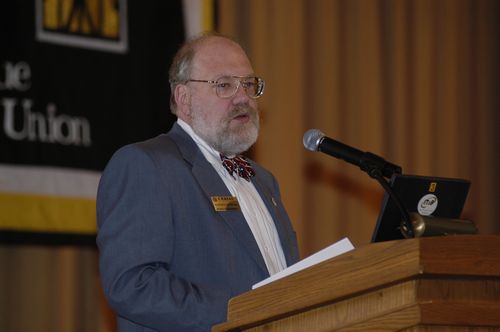 Gene Spafford presents the Cisco Scholarship awards
