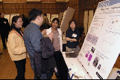 The Symposium kicked off with a poster session in which over 50 students & faculty teams presented their work and discussed their research.