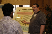 The Symposium kicked off with a poster session in which over 50 students & faculty teams presented their work and discussed their research.