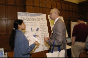 The Symposium kicked off with a poster session in which over 50 students & faculty teams presented their work and discussed their research.