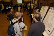 The Symposium kicked off with a poster session in which over 50 students & faculty teams presented their work and discussed their research.