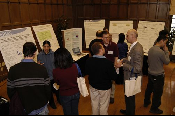 The Symposium kicked off with a poster session in which over 50 students & faculty teams presented their work and discussed their research.