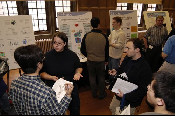The Symposium kicked off with a poster session in which over 50 students & faculty teams presented their work and discussed their research.