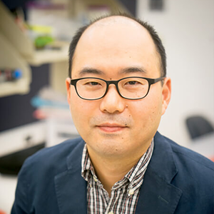 Head shot photo of Young Kim